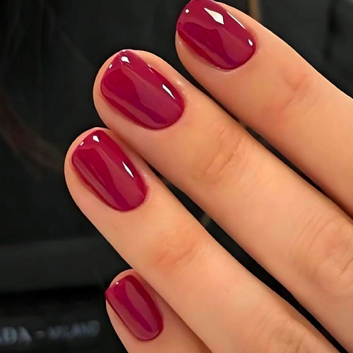 Selah Luxe Official Raspberry press-on nails, solid color, with application kit.