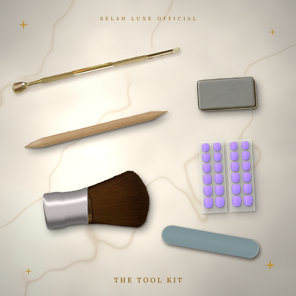 Flat lay of the Selah Luxe Official tool kit with brush, cuticle tools, buff block, nail file and adhesive pads.
