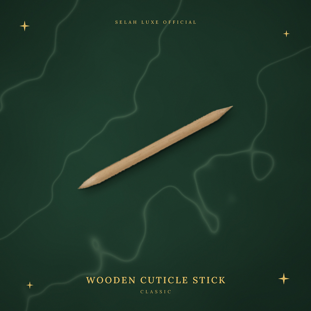Selah Luxe Official wooden cuticle stick on a dark green background.